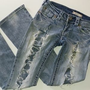 Distressed bootcut jeans